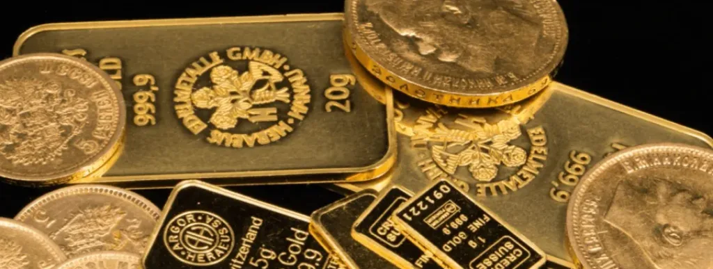 gold bullion bars pile