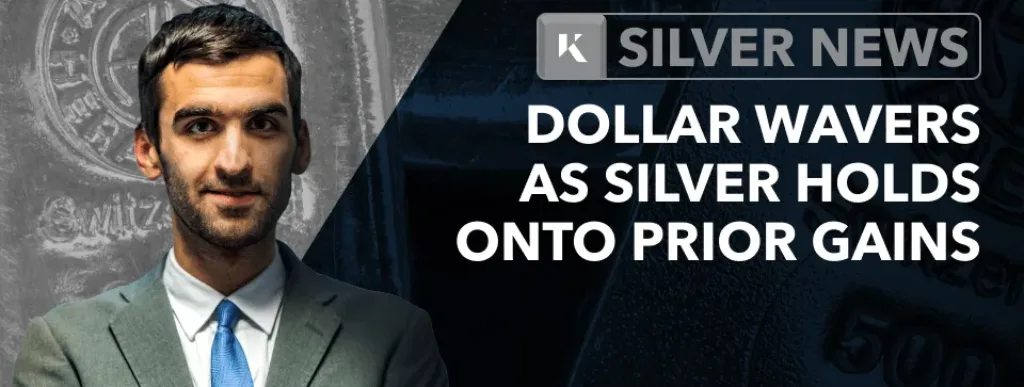 silver holds onto gains dollar wavers