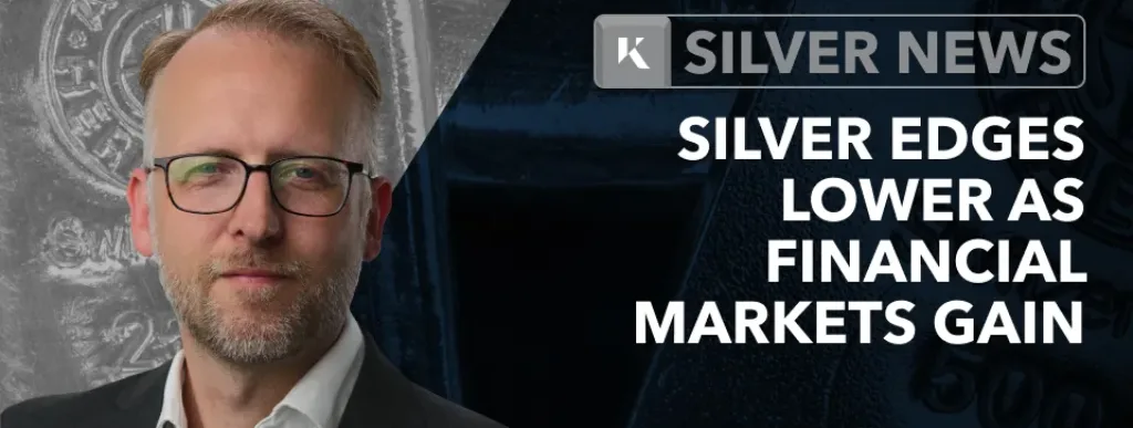 silver edges lower financial markets gain
