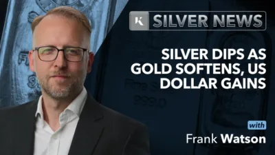 frank watson market analyst in front of silver background