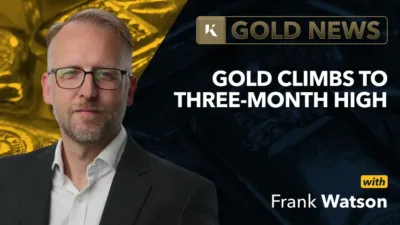 frank watson analyst in front of gold bar background