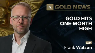 frank watson analyst in front of gold bar background