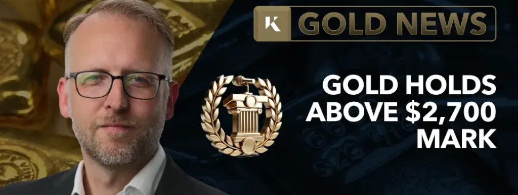 frank watson analyst in front of gold bar background