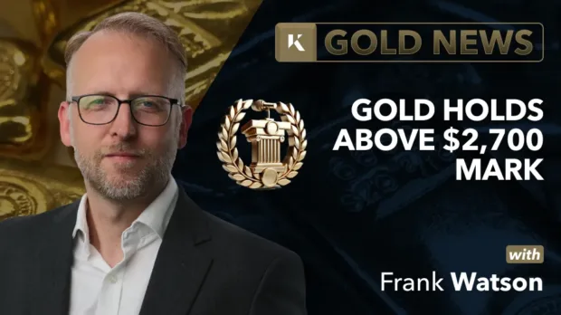 frank watson analyst in front of gold bar background