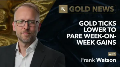 frank watson analyst in front of gold bar background