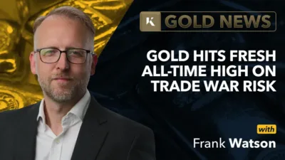 frank watson analyst in front of gold bar background