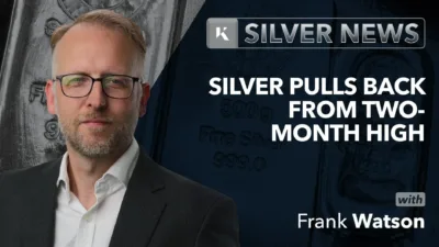 frank watson in front of silver bullion bar