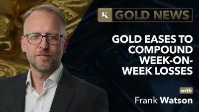 frank watson headshot in front of gold bullion bar